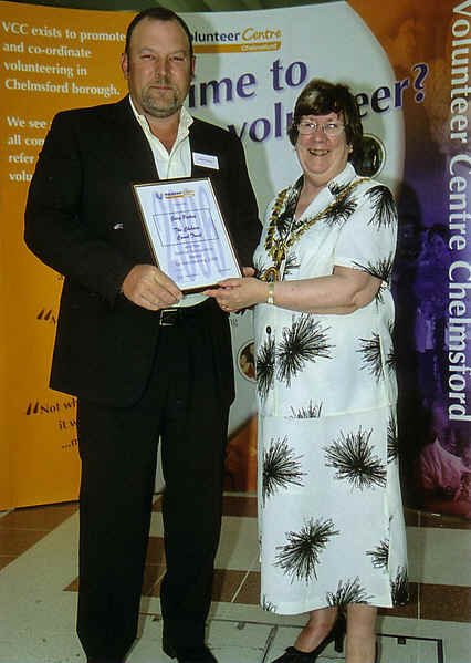 Trust member Gary Patten receives an award from Chelmsford's mayor, Councillor Margaret Hutchon,  for his voluntary pennywort removal efforts.